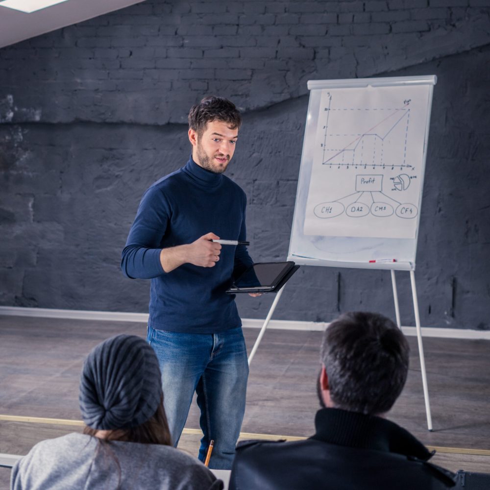 speaker man talking to audience during conference